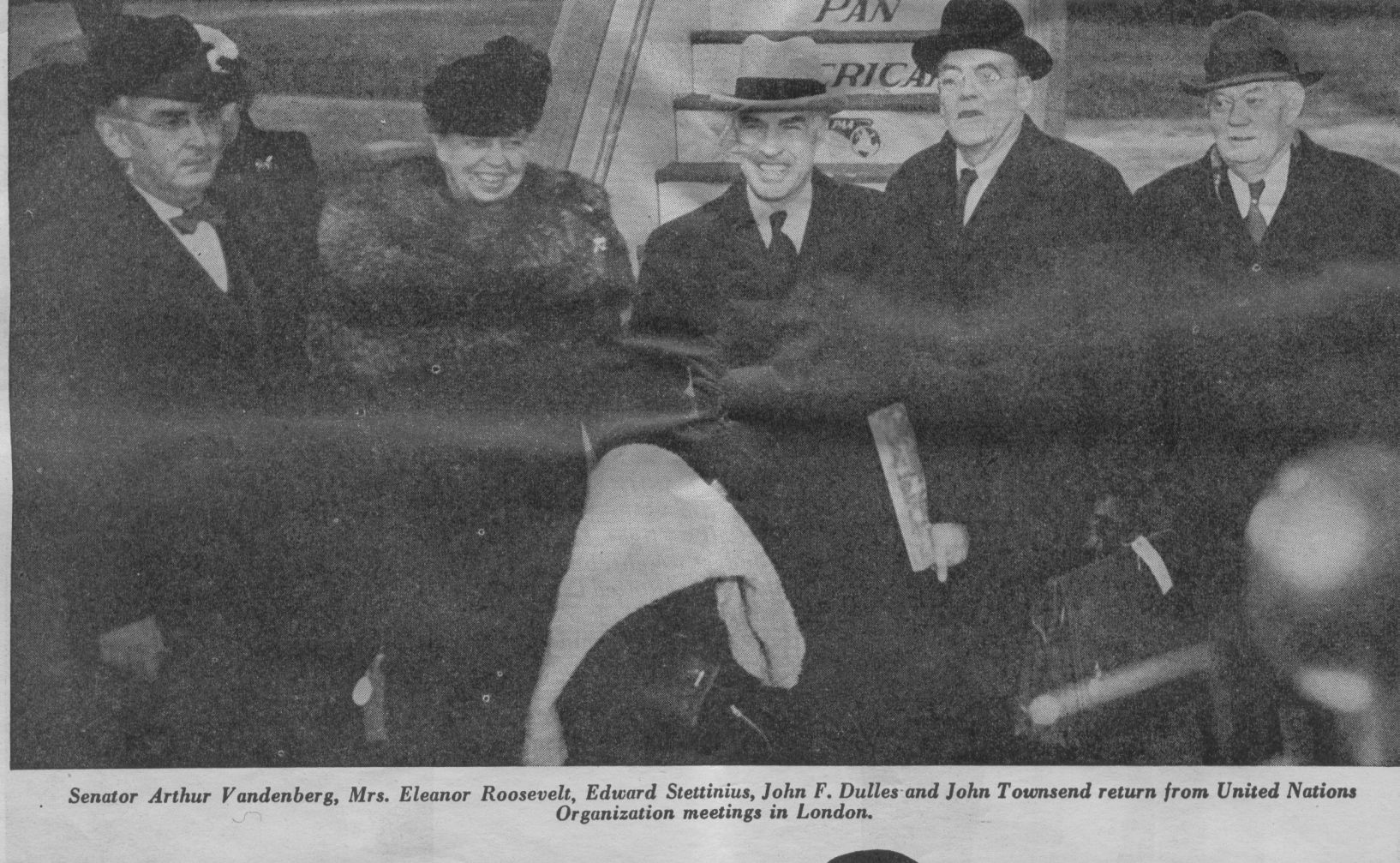 1946 Eleanor Roosevelt & party pose by Pan Am Clipper